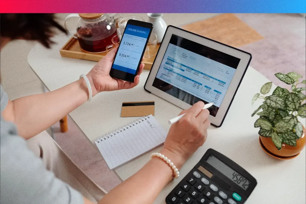 A person calculating payroll to illustrate how to pay contractors internationally
